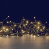Guirlande lumineuse animée à 104 LED blanc chaud + 24 LED flash sur câble vert Flicker Light® - 8 m
