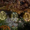 Lanterne solaire à suspendre spirale à LED blanc chaud