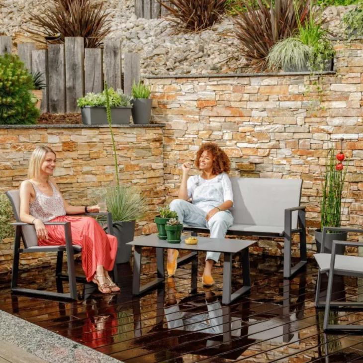 Salon de jardin en aluminium graphite et toile textylène gris perle Alysse - 4 éléments (canapé, table basse et deux fauteuils)