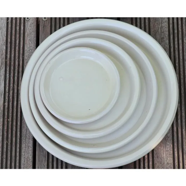 Soucoupe coloris beige en terre émaillée - Ø 33 cm