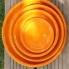 Soucoupe en terre cuite émaillée orange Savane Les Poteries d’Albi - Ø 36 cm