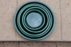 Soucoupe en terre émaillée vert Jade Les Poteries d’Albi - Ø 41 cm
