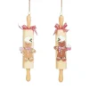 Suspension pain d’épice sur rouleau à pâtisserie en bois FSC - 21 x 5 x 4 cm